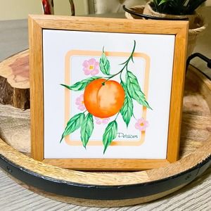 Peach Tile With Persicum Pink Flower In Wooden Frame